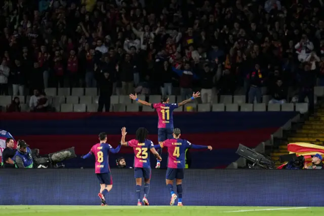 Raphinha of FC Barcelona celebrates.