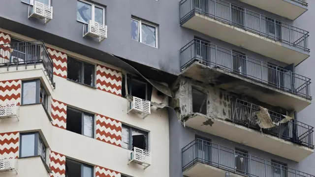 A multi-storey residential building in the Vidnoye district of Moscow shows signs of drone attack damage.