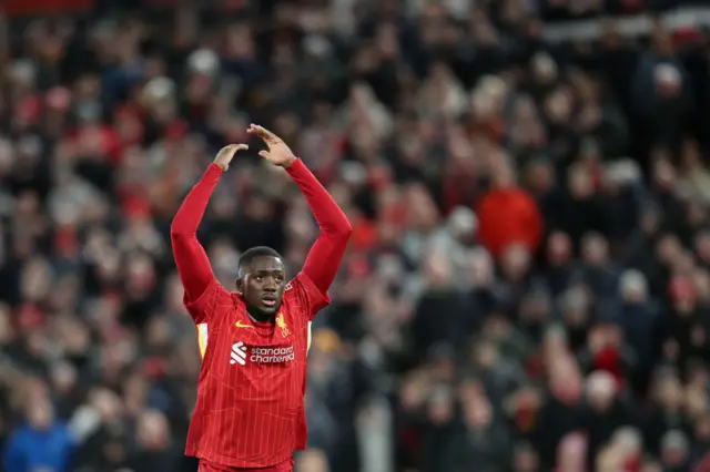 Ibrahima Konate of Liverpool gestures to get the home crowd going.