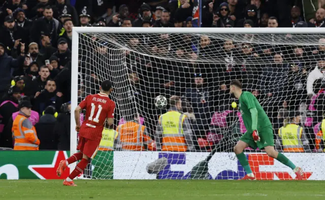 Liverpool's Mohamed Salah after he scores a penalty.