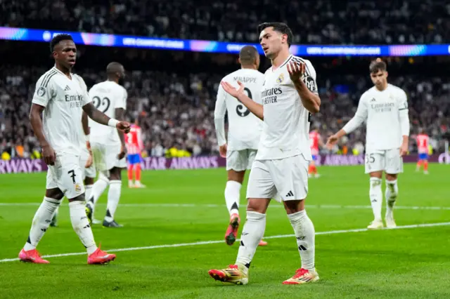 Brahim Diaz of Real Madrid celebrates scoring his side's second goal during the UEFA Champions League 2024/25 UEFA Champions League 2024/25 Round of 16 first leg match between Real Madrid C.F. and Atletico de Madrid.