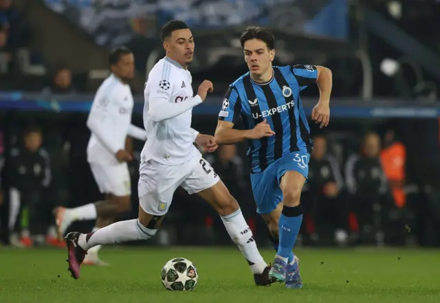 Ardon Jashari of Club Brugge battles Morgan Rogers of Aston Villa.