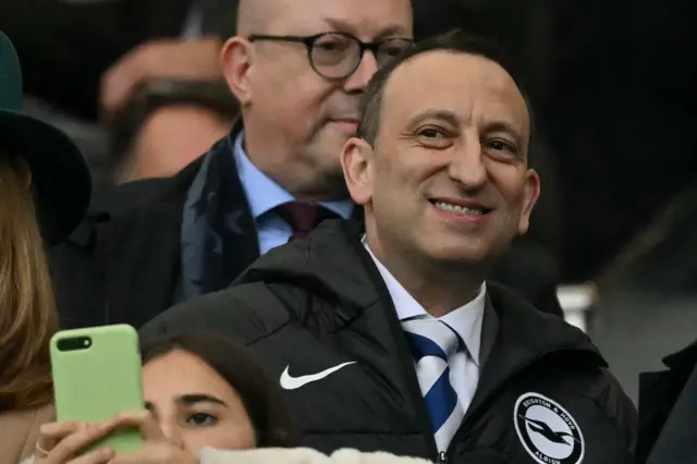 Tony Bloom looks on