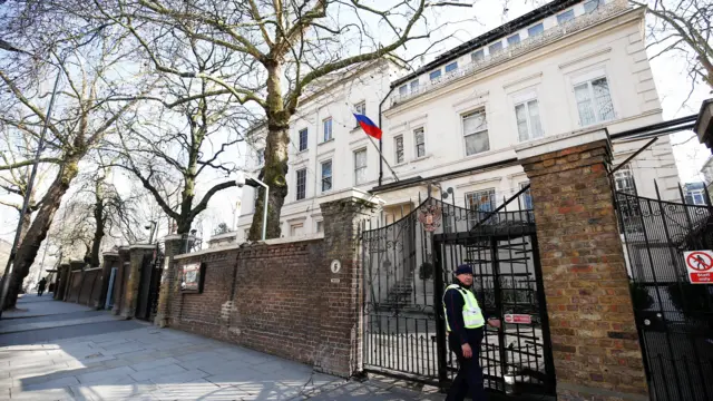 A security guard outside the Russian Embassy in London - file image from 2018