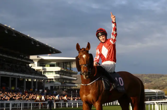 Michael O'Sullivan celebrates winning at Cheltenham on Jazzy Matty in 2023