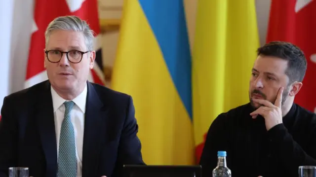 Prime Minister Keir Starmer and Ukraine's President Volodymyr Zelensky attend a plenary meeting as European leaders gather for a summit on Ukraine at Lancaster House in London