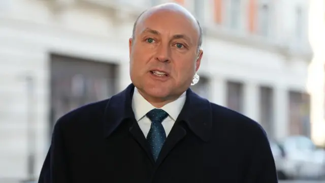 Shadow business and trade secretary Andrew Griffith speaks to the media outside BBC Broadcasting House in London