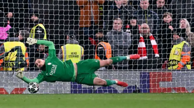 Gianluigi Donnarumma saves a penalty