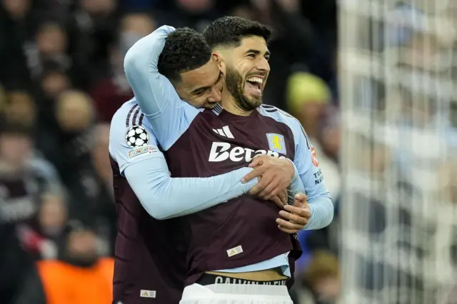 Marco Asensio of Aston Villa (R) celebrates with his teammates