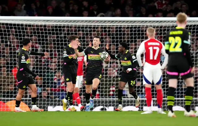 PSV Eindhoven's Ivan Perisic (centre) celebrates.