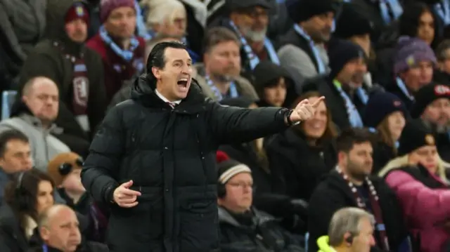 Aston Villa's Spanish head coach Unai Emery reacts during the Champions League match.