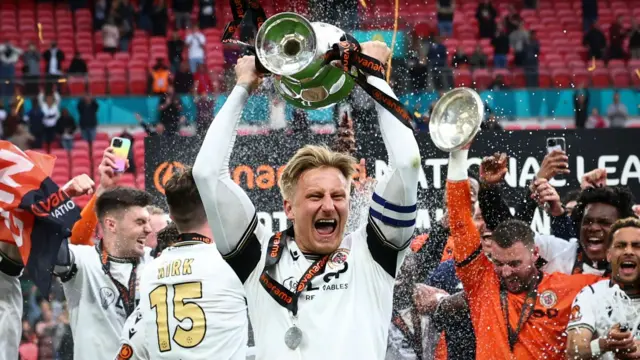 Byron Webster celebrates winning the National League play-offs