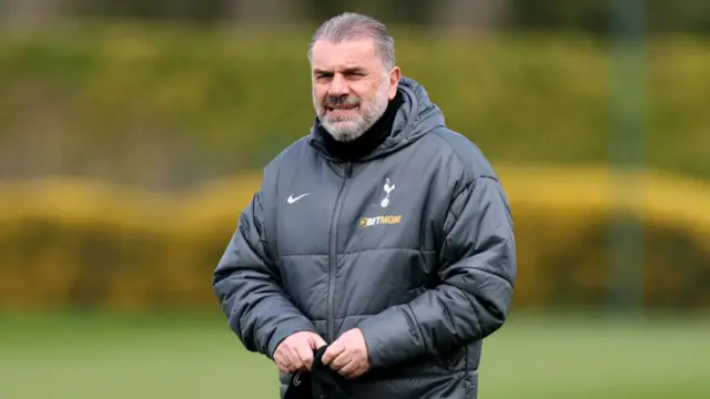 Ange Postecoglou, Manager of Tottenham Hotspur, looks on during training.