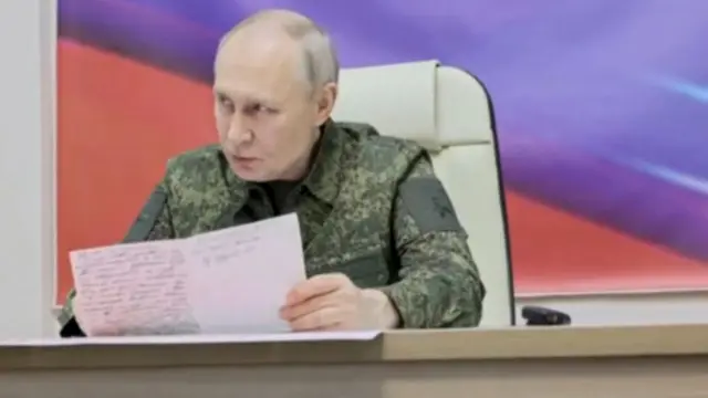 Russian President Vladimir Putin visiting military headquarters in the Kursk region