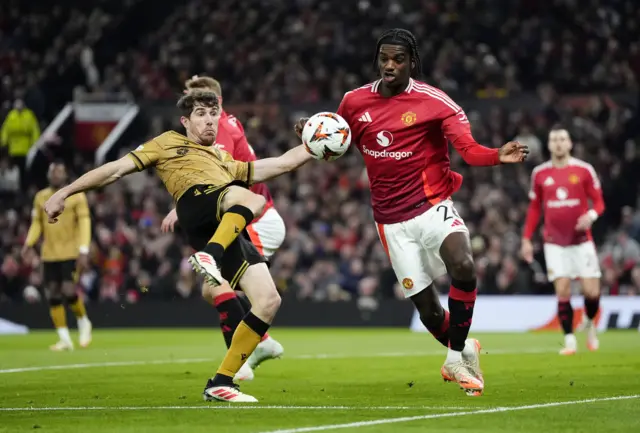 Real Sociedad's Aritz Elustondo (left) and Manchester United's Ayden Heaven battle for the ball