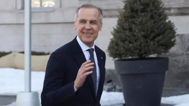 Mark Carney walking into Rideau Hall to be sworn in