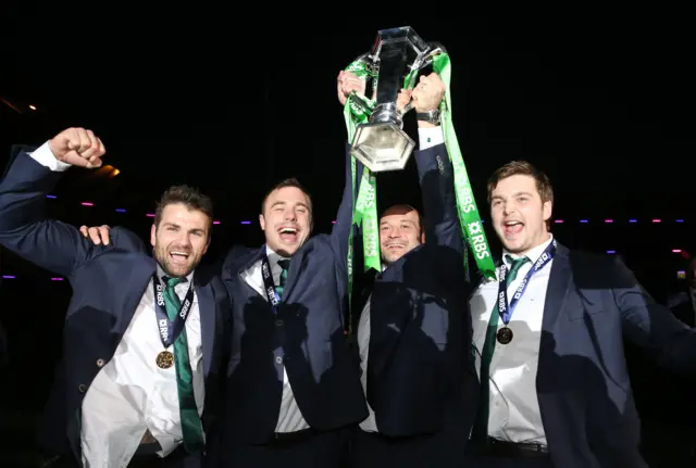 Tommy Bowe and Rory Best lift the Six Nations in their suits