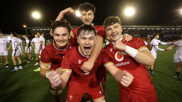 Deian Gwynne, Elis Price, Dan Gemine and Evan Wood of Wales celebrates at full time