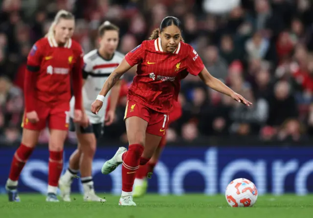 Olivia Smith of Liverpool scores her team's third goal from the penalty spot.