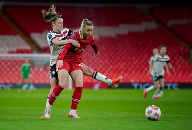 Manchester United's Ella Toone (left) and Liverpool's Sam Kerr battle for the ball.