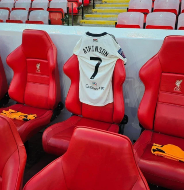 Poppy Atkinson's shirt in the Manchester United dugout