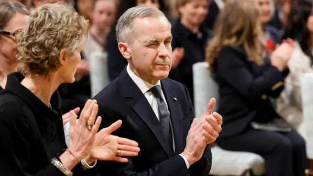 Canadian prime minister Mark Carney winks at the camera following his swearing in.