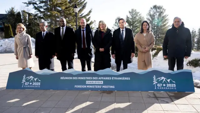 The G7 foreign ministers line up for a photograph at their meeting in Canada