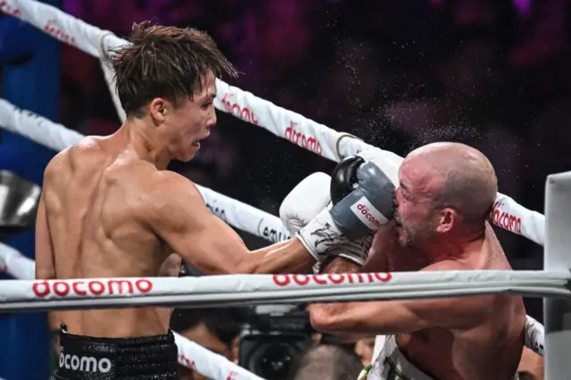 Naoya Inoue lands a punch on the face of TJ Doheny during their boxing match at Ariake Arena in Tokyo