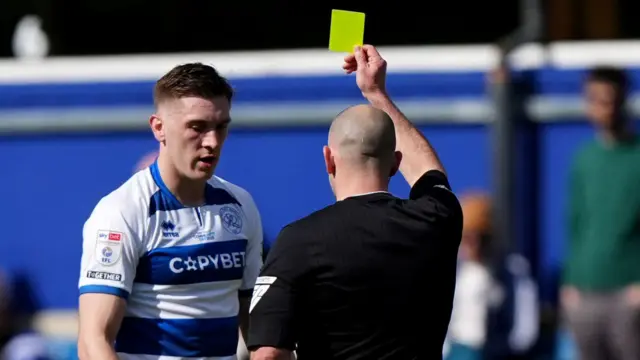 QPR's Jimmy Dunne is yellow carded