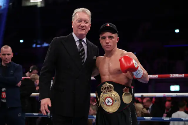 Nick Ball poses with his world title beside Frank Warren