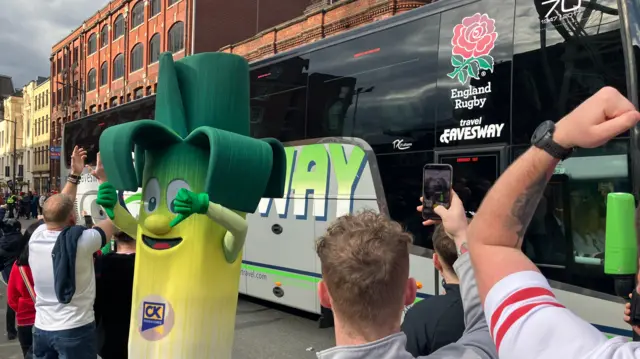 Leek jeers England bus