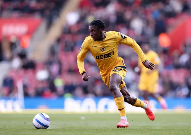 Jean-Ricner Bellegarde of Wolverhampton Wanderers runs for the ball