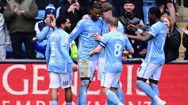 Coventry players celebrate with Haji Wright