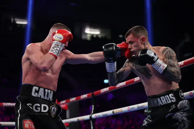 Andrew Cain and Charlie Edwards trading punches