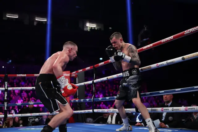 Andrew Cain and Charlie Edwards in the boxing ring