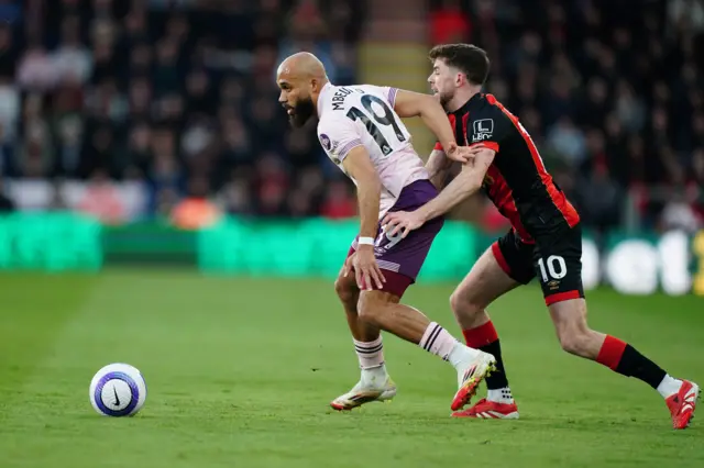 Brentford's Bryan Mbeumo (left) and Bournemouth's Ryan Christie battle for the ball