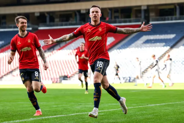 Gary Oliver celebrates scoring at Hampden