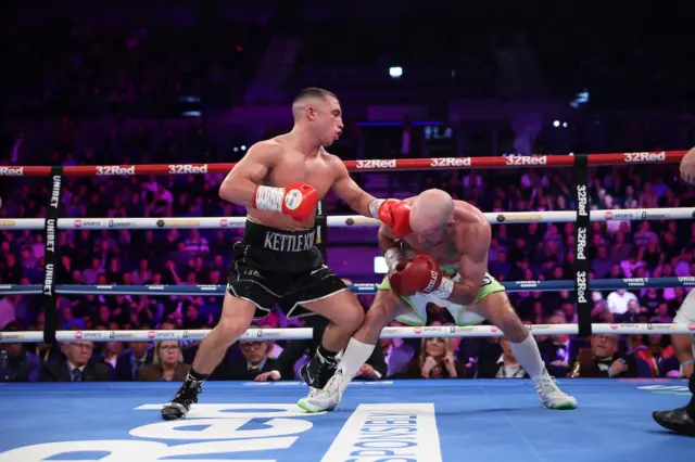 Nick Ball punches TJ Doheny during the WBA World Featherweight title fight