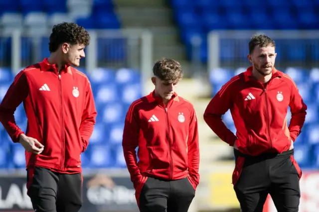 Leighton Clarkson (centre) drops to the Aberdeen bench