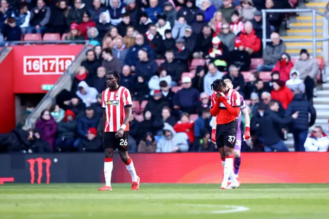 Lesley Ugochukwu(L) and Armel Bella-Kotchap of Southampton dejected