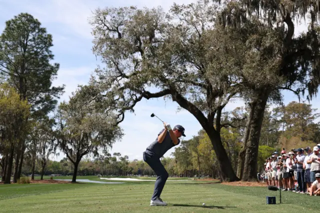 Keegan Bradley tees off at the sixth hole