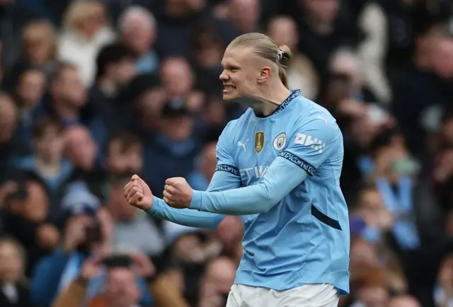 Manchester City's Erling Haaland celebrates.