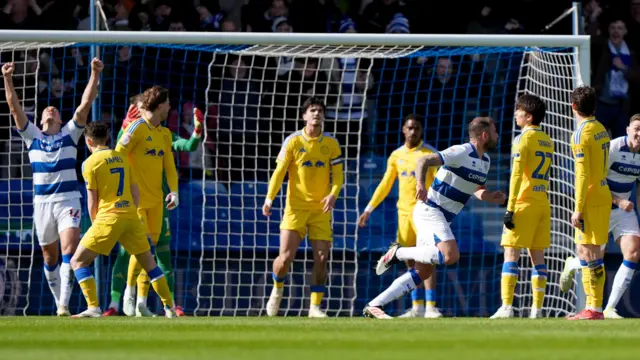 Steve Cook peels away to celebrates after heading QPR's second against Leeds