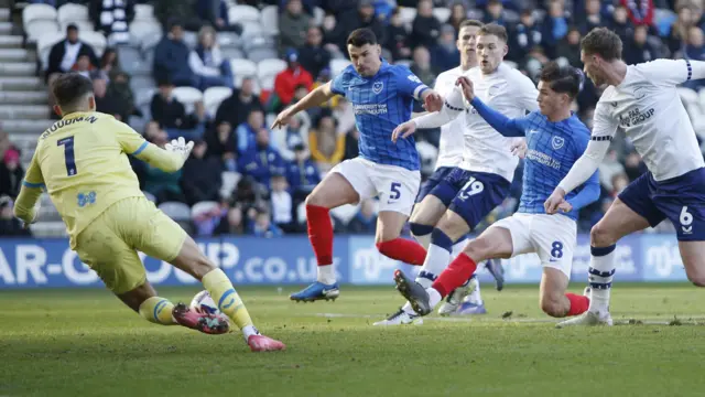 Portsmouth's Freddie Potts stabs a shot wide