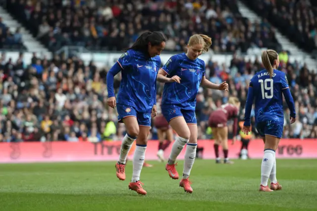 Mayra Ramirez and Sjoeke Nüsken dancing in celebration to Ramirez's goal