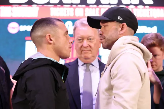 Nick Ball and TJ Doheny stand face to face at a boxing news conference