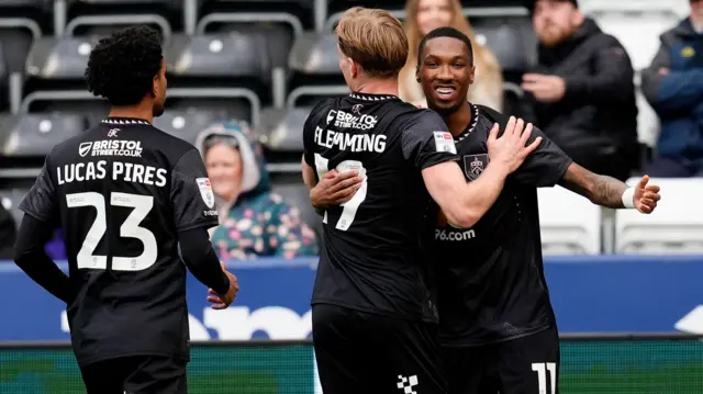 Burnley goalscorer Jaidon Anthony celebrates with team-mates