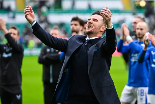 Barry Ferguson celebrates with his players