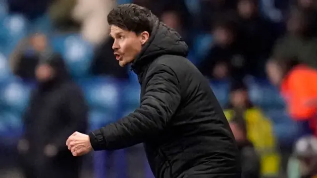 Sheffield Wednesday boss Danny Rohl delivers instructions to his team from the touchline