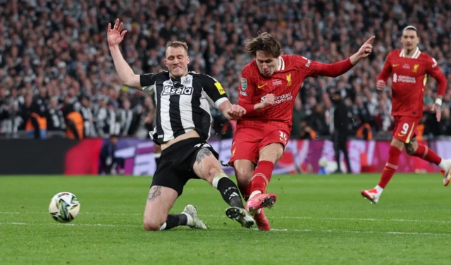 Liverpool's Federico Chiesa scores their first goal